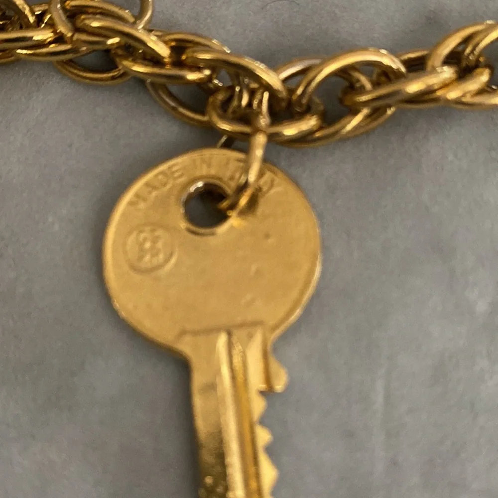 Vintage 1980s Rare Moschino Redwall 15 iconic brand gold charm necklace